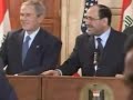 George Bush Shoe Attack - Reporter throws shoes at President during Iraq press conference