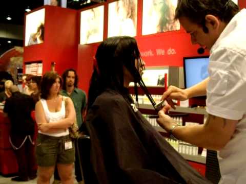 Nick Arrojo - Nick is cutting a models hair with the razor.