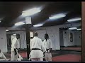 master reynolds sparring with mr roy fowler at detroit martial arts institute.  isshinryu style is used.