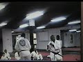 master reynolds sparring with mr roy fowler at detroit martial arts institute.  isshinryu style is used.