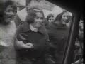 This is when the Beatles arrived in the USA in Feb. 1964. They are escorted to their 1962 Cadillac limos at the airport and driven to the hotel with some difficulty getting into the hotel. George was placed in a separate limo because he had the flu and they wanted him away from the other 3. His older sister cared for him during the first few days of the tour.