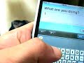 One hand hold iPod touch typing