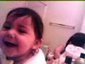 my baby Angelina Laughing at a gold doorknob