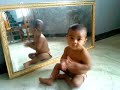 BABY IN MIRROR