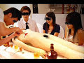 There's gotta be something satifying about conquering your enemy on the battlefield and then serving him up at the post-battle feast. ( a proverb from a country but I don't remember which one) anyway here is the deal:For many anti-Japanese racists, eating rolls of raw fish can be a tough sell. But if youre one of the thousands of open-minded racists who've fallen under the spell of sushi in recent years, then what better way to totally ruin it for yourself than eating it out of a dead person?At Cannibalistic Sushi, an edible body is wheeled out to your family on a gurney, along with as much scotch as you need to disinfect your forks and convince yourself that this was a good idea. Then, its time to dig in! Whether you're using chopsticks, a knife and fork, or your bare hands, one things for certain: youll be feasting on the entrails of a human being.The artisans at Cannibalistic Sushi have taken pains to ensure that the human body you are ripping into is as lifelike as possible. The sushi inside is shaped to resemble human organs, a red blood sauce is embedded in the skin layer so as to create realistic bleeding, and your corpse even has a set of papier maché genitals! Its like your third grade arts and crafts project all over again.If youre an experienced cannibal, make sure to specify a male or female corpse when ordering, and show the other diners just how sophisticated your taste in human flesh is. And although eating at Cannibalistic Sushi may not quell the voices in your head that command you to kill and devour those around you, it will certainly shut them up for a day or two. Confuse your inner psychopath by making a reservation at Cannibalistic Sushi today!