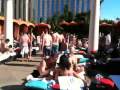 Sexy hot Vegas pool party with girls in bathing suits and bikinis almost topless