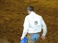 John Shoberg dismounting bronc after ride