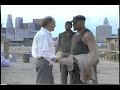 This is a video that used to be played during their live performances,not the official music video.Features movie and documentary snippets.