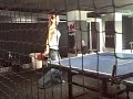 ashley playing a variety of games at the arcade: ping pong, baseball hitting, and baseball pitching