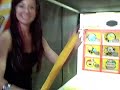 ashley playing a variety of games at the arcade: ping pong, baseball hitting, and baseball pitching