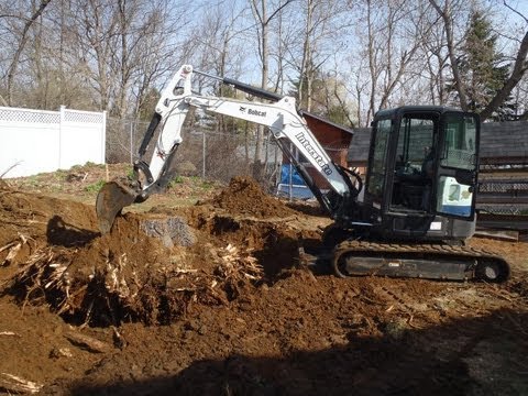 Bobcat E50 Removing Big 32" Stump