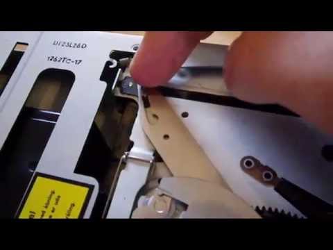 how to fix a jammed 6 disc cd player