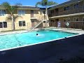 Jackass, jumping off roof into a pool