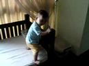 Gabriel Trying to get down the bed