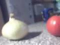 onion hating up a tomto