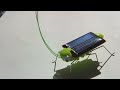 Solar grasshopper on paper