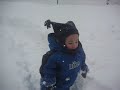we had a big snow storm come through and kayson is trying to treck through the snow