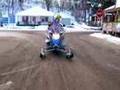 Ski wheels for snowmobiles with auto retract
