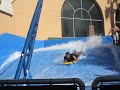 Riding flow rider at the wave house in San Diego