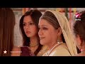 Anjali reminds Arnav to give their mother's bangle to Khushi. Khushi's dress tears while grooming. She wears Arnav's shirt and tears his shirt also. Arnav sees Manorama spying on him and pretends to romance with Khushi. The guests are gossiping about Arnav's discreet wedding. Arnav defends Khushi and insults the guests. Nani apologizes to the guests. After the function, Manorama and Nani blame Khushi for their family's humiliation. Nani rebukes Arnav for disrespecting their guests.