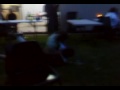 Scott wrestling his dad at a party.