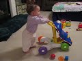 Emily Walking with Help of Walking Toy