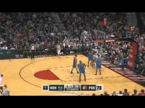 Nicolas Batum dunks over Anthony Davis
