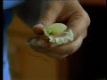 Top cake decorator Elaine MacGregor shows the viewer how to make lifelike edible floral decorations using simple sugarpaste techniques. This video shows how to make a lifelike brightly coloured orchid from sugarpaste.