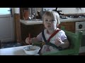 Alicia eating with a spoon