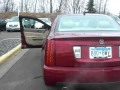 Chad Rawson presenting Kelly Rivard's 2007 Cadillac STS4 at Luther Nissan Kia