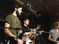 local band, the howlers, playing at xhedo's cafe. band members: brian boeckl, max smith, jacob rosen, matt acomb, and peter acomb. they all play too many instruments to keep track of.