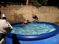 Funny swimming pool bike jump