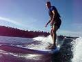 longboard lake surfing dude