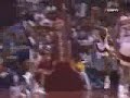 Spud Webb dunks over Manute Bol