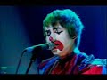 Arctic Monkeys performing Fluorescent Adolescent dressed as clwons. Live on Friday Night with Jonathan Ross