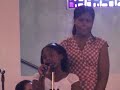 Nia singing I am Praying