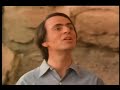 Carl Sagan explains cosmic rays and neutron stars