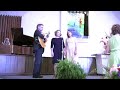 kathryn & molly green are accompanied on the guitar by their father, robert green, in 