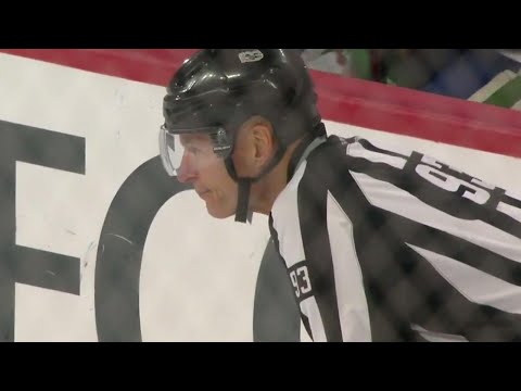 Video: Flyers' Gostisbehere takes out linesman Murphy while trying to keep puck in