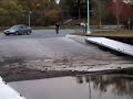 Fat kid rides a skateboard off a boat launch Fat kid rides a skateboard off a boat launch