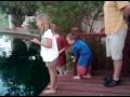 Joey Catching 1st fish with help from Jack and Mary.3GP