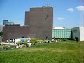 Man Walking Down the Side of a Building