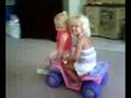 Two toddlers on 4 wheeler stunting