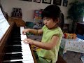 Zoei playing piano , she just turned 4 years old
