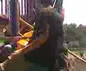 Joey in a Bag goes down a slid
