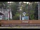 CSX TRAINS and a guy walking around lowered gates