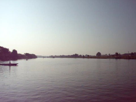 Passing the Meuse River by ferryboat