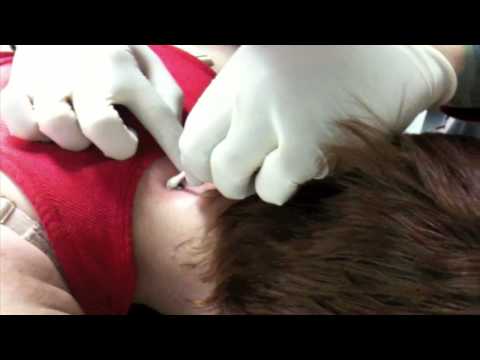 AG got the nape of her neck pierced and since she couldn't see it I filmed 
