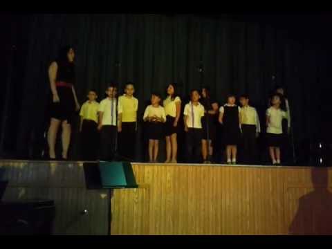 Dondi choir - Our Lady of Grace Childrens Choir sings in music show. Lil Phil is 3rd from left.
