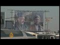 The mostly Shia Hazara community of Afghanistan is poised to have a significant effect on the country's elections. Eager to tap into the Hazara vote, Hamid Karzai, the incumbent president, recently signed off on a controversial Shia family law. The law has sparked international criticism as limiting women's rights, but as Al Jazeera's Hashem Ahelbarra reports, Karzai is unlikely to risk losing the Hazara vote by repealing the law.